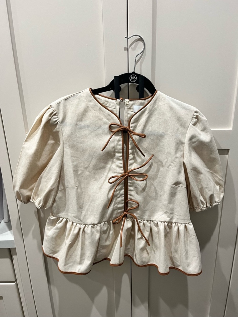 NWT Cream Peplum Blouse with Brown Trim and Front Bow Ties